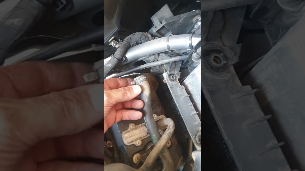 BMW F800 GS spark plug change, due to jerking. Water in the cavity.