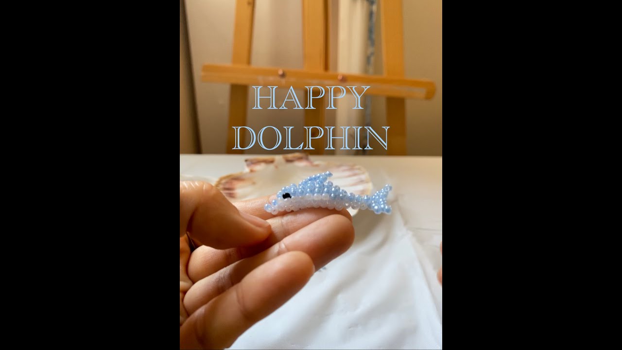Happy Dolphin jewelry/earrings from Japanese TOHO beads
