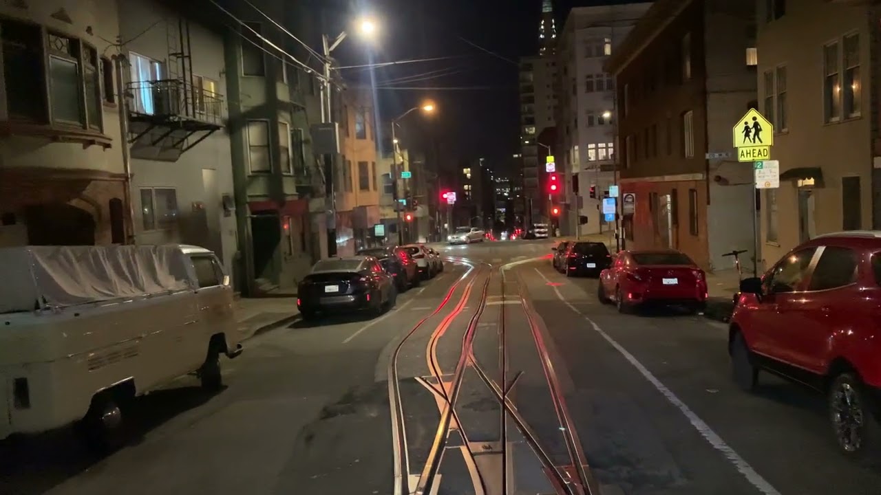 Riding the Iconic Cable Car during the night in San Francisco 