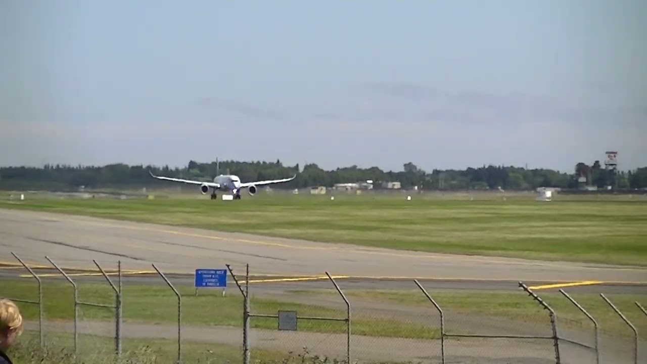 Cathy A350-1000 departing Christchurch on a sort of windy calm day
