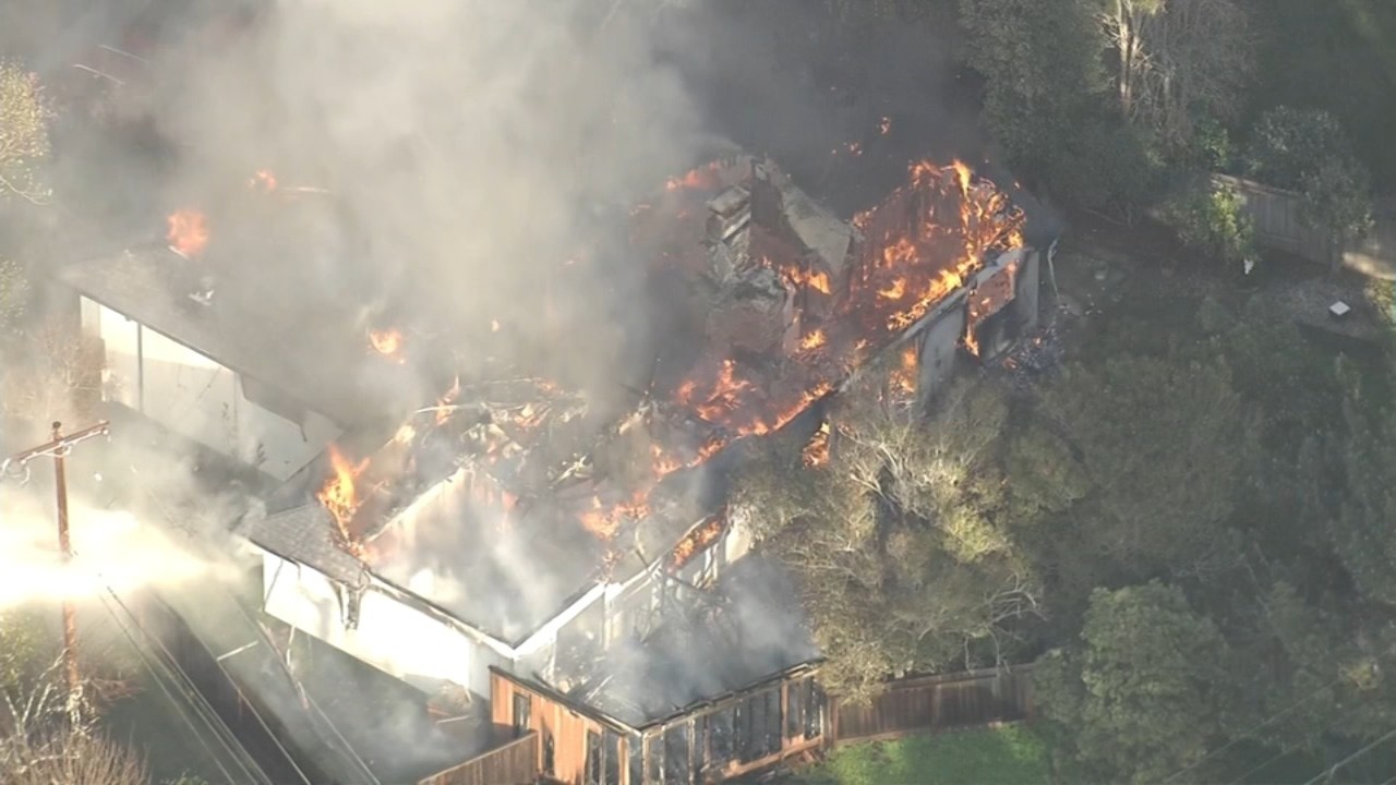 Police investigating homicide after shooting, large fire at San Bruno home