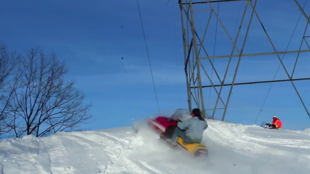 YAMAHA ENTICER / BRAVO HUGE SNOWMOBILE JUMPS !!!!! LARRY ENTICER & BARRY BRAVO !!!!!