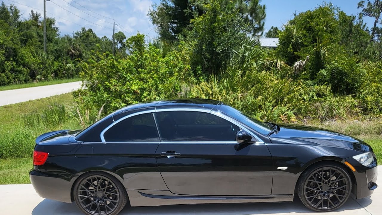 BMW convertible hinge cover trim spring repair