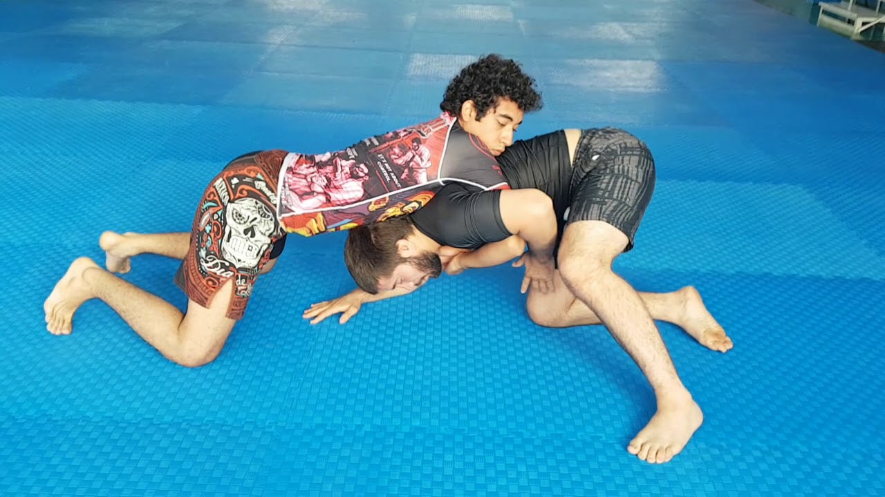 Como escapar de posición de tortuga en jiu jitsu brasileño