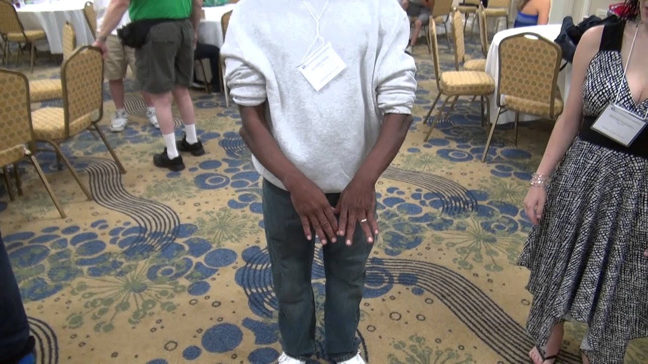 Attendees of the Nail Patella syndrome Worldwide conference showing off their elbows