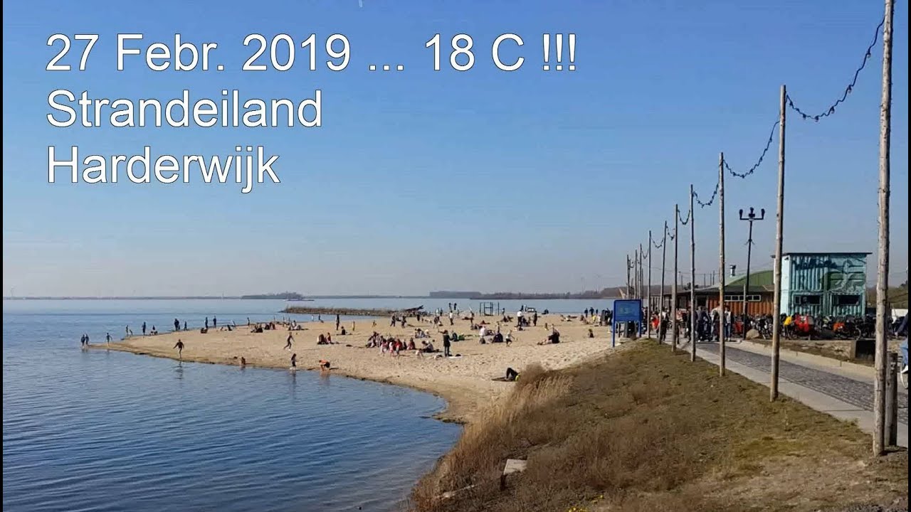 Strandeiland Harderwijk 27 febr. 2019 ,18 C !!! warmterecord  ,zonnen op het strand.