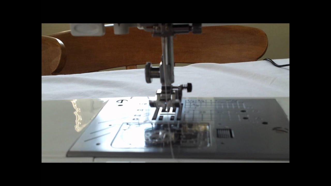 Putting the bobbin in my Janone TXL607 and threading the machine