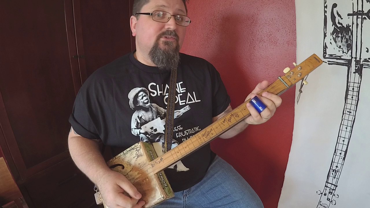 How to Play Cigar Box Guitar RHYTHMICALLY!  This is the secret of the scratches