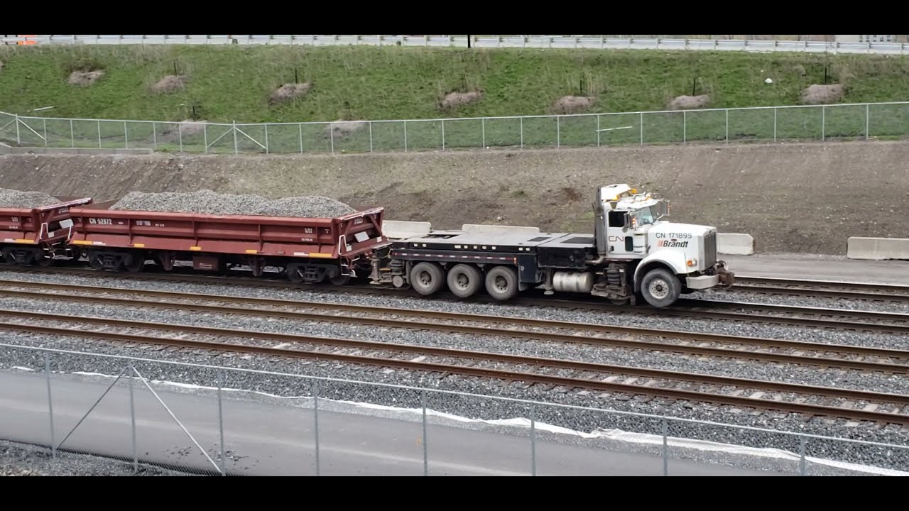TRAINS CN Maintenance of Way Equipment Plus Ballast Cars and Hy Rail Truck