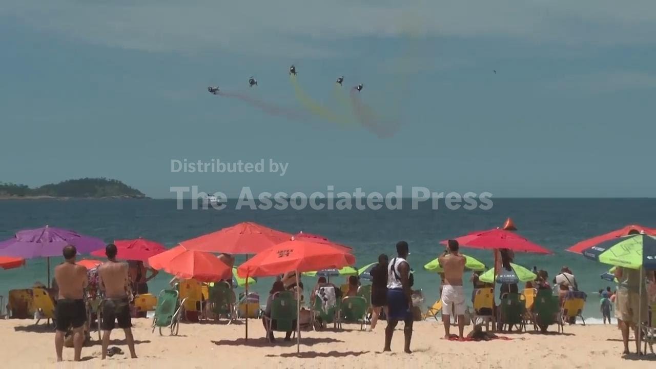 Spain’s Air Force helicopters perform aerial display over Rio’s Ipanema beach