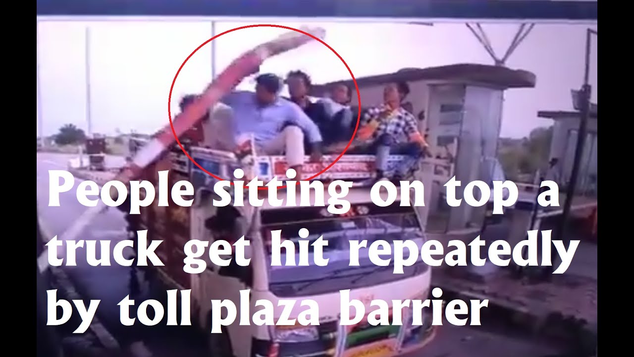 Man sitting on truck get hit repeatedly by toll plaza barrier | Watch Viral Video