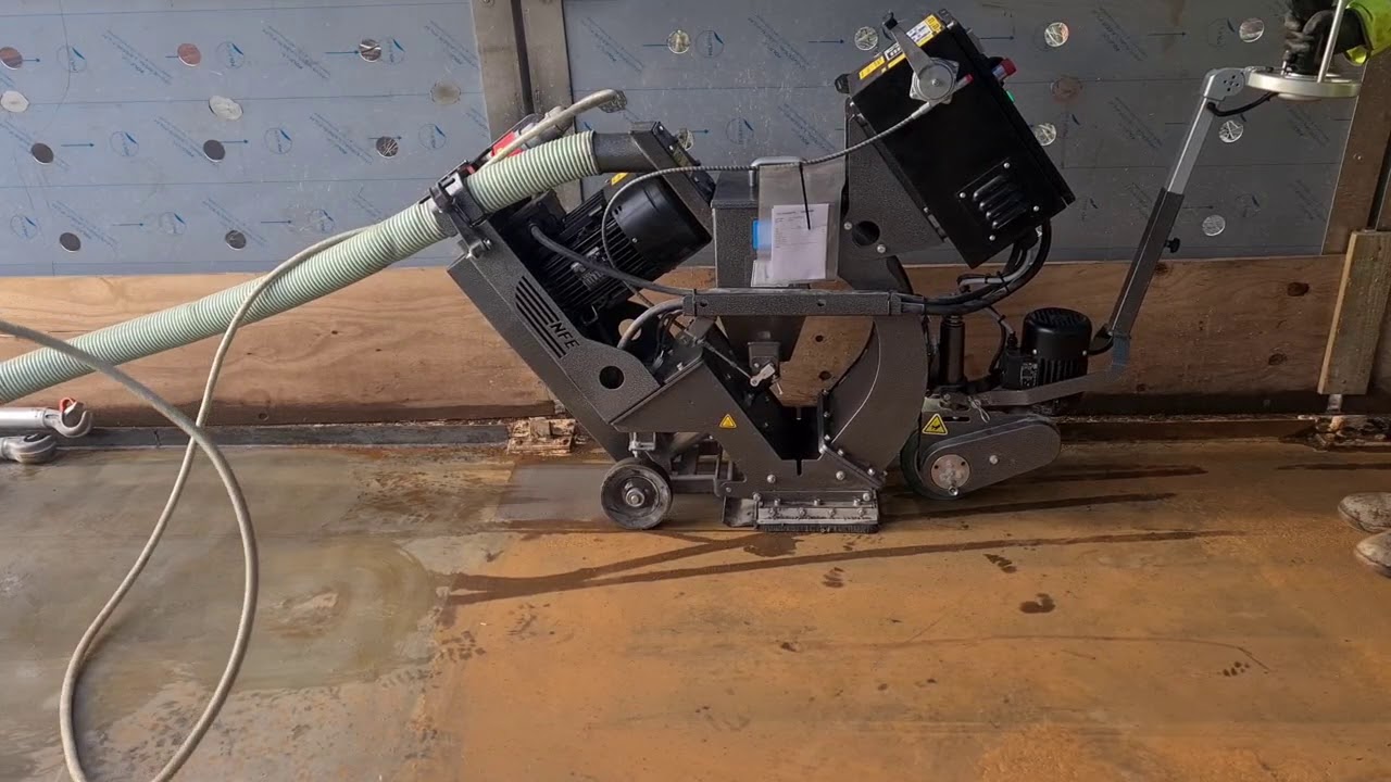 NFE A97 shot blaster blasting a bridge deck.