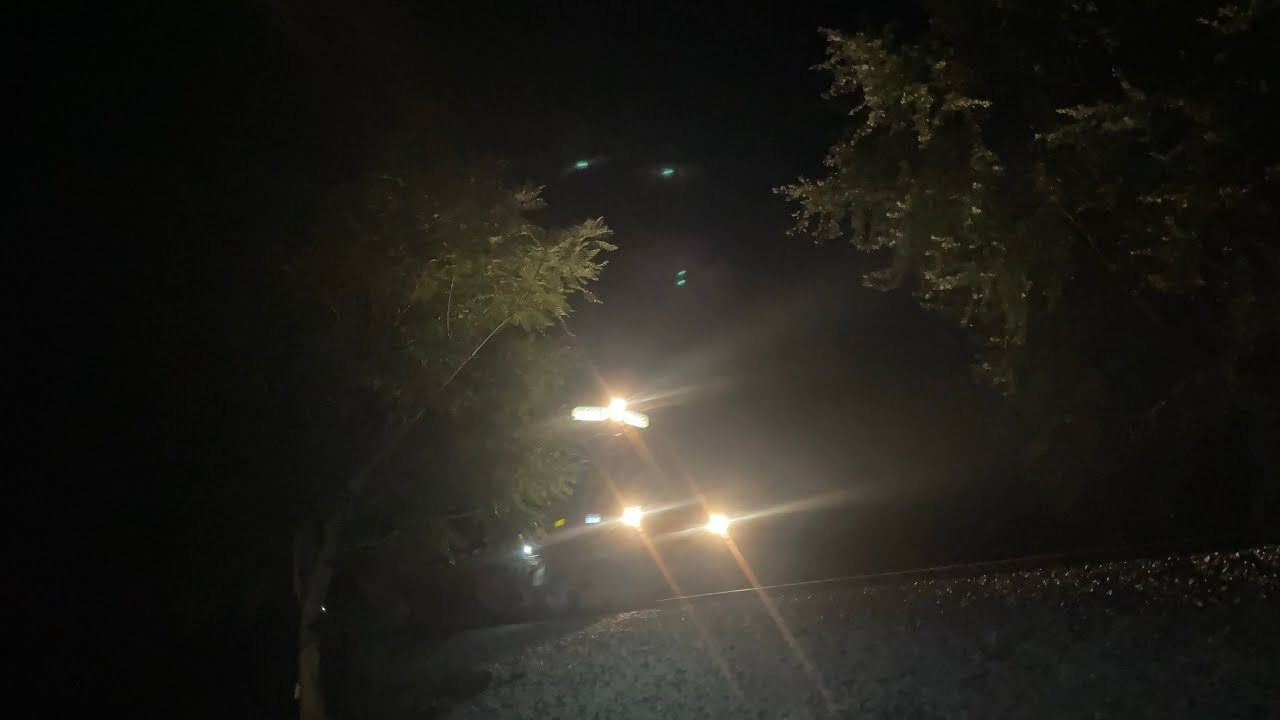 W&LE trains at night and a NS train in Hudson, Oh