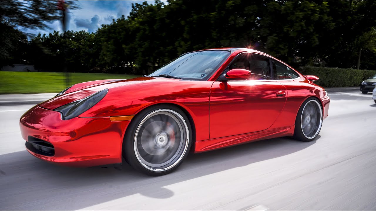 Wrapped up this silver Porsche in Avery Red chrome vinyl. - Car Wrap Company Near Me