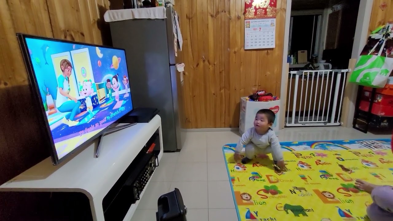 My boy doing yoga with coco mealon