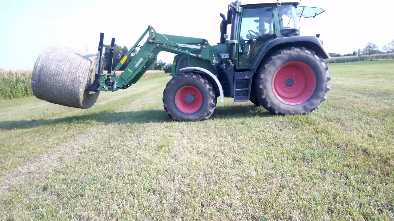 Raccolta rotoballe di fieno con Fendt 412 Vario TMS