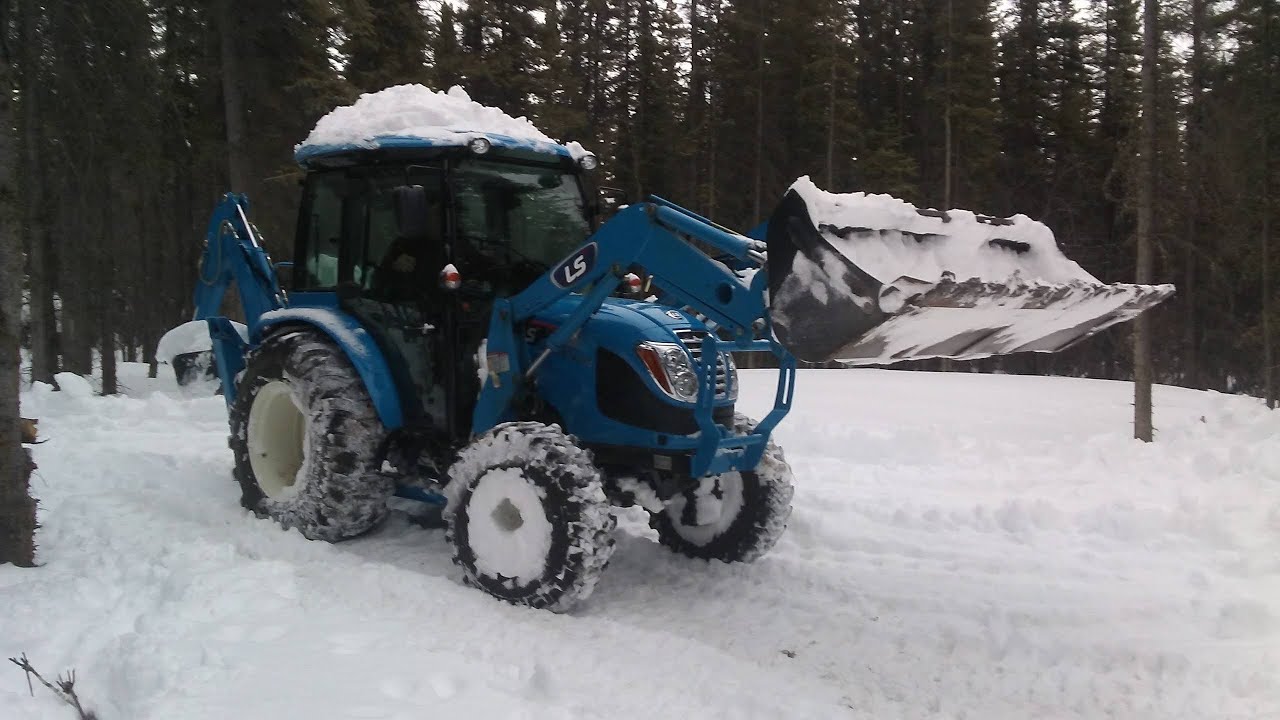 You Need A Tractor To Move Snow In Alaska Not Shovels!