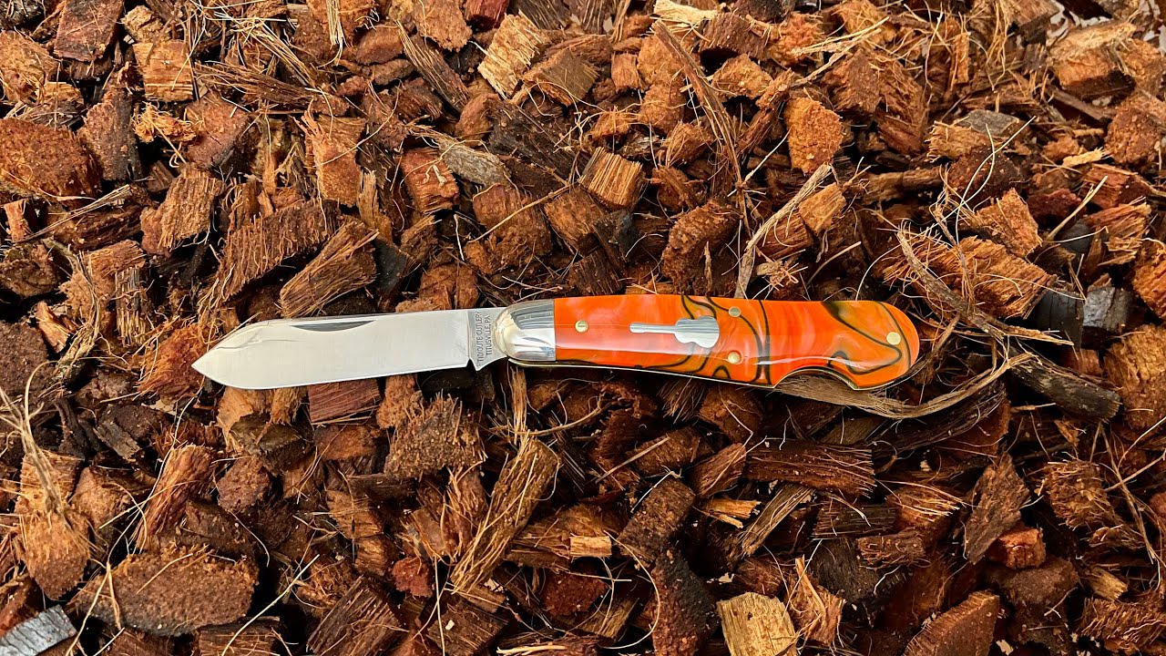 Great Eastern Cutlery #56 Orange Scramble Dogleg Jack. A Classic Pattern with a Groovy Shield!