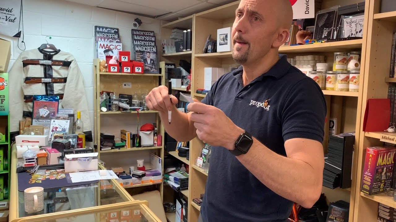 Dave performs Trevor Duffy's amazing Phil Plus trick for some customers