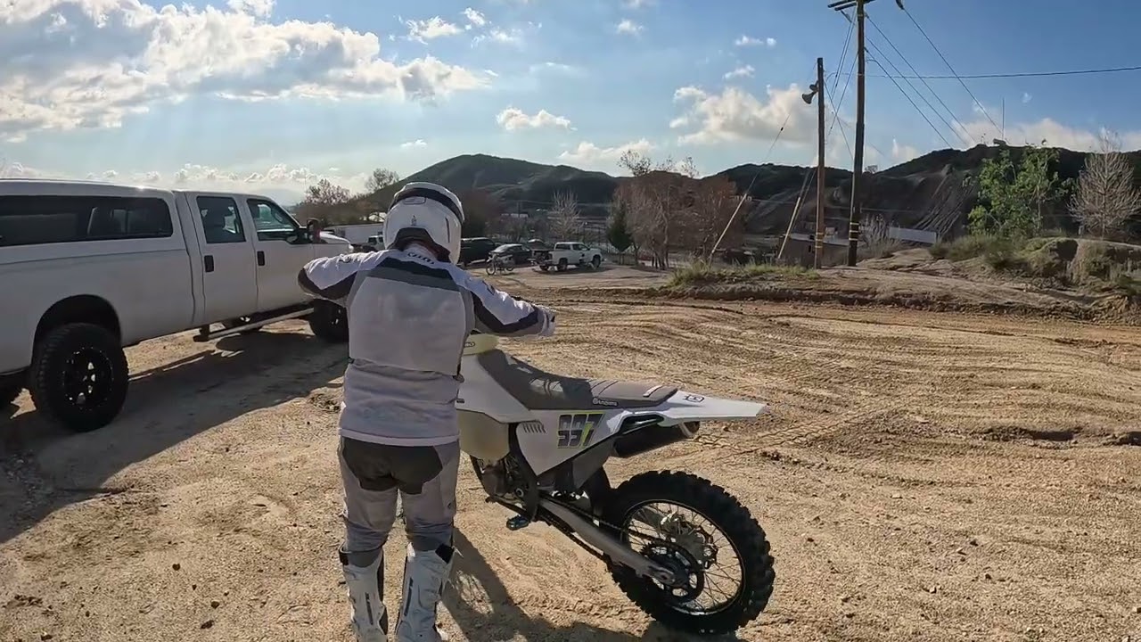 Watching my husband ride his motorcycle at glen Helen.