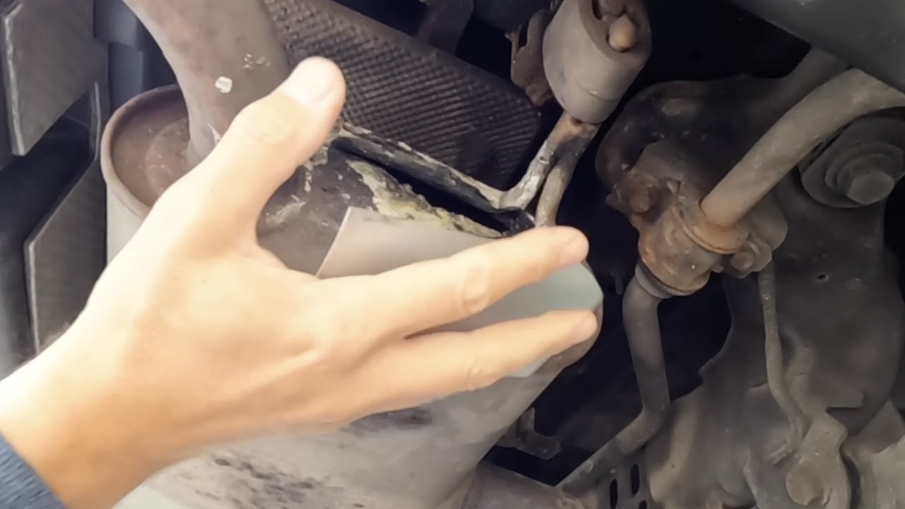 Repairing a Big Hole in Muffler - with Gun Gum and Patchwork