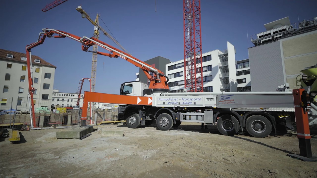 SCHWING-Stetter - Jochum Concrete Logistics places concrete for a hospital expansion in Germany