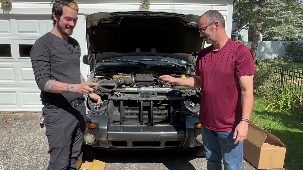 2003 jeep liberty headlight assembly replacement.