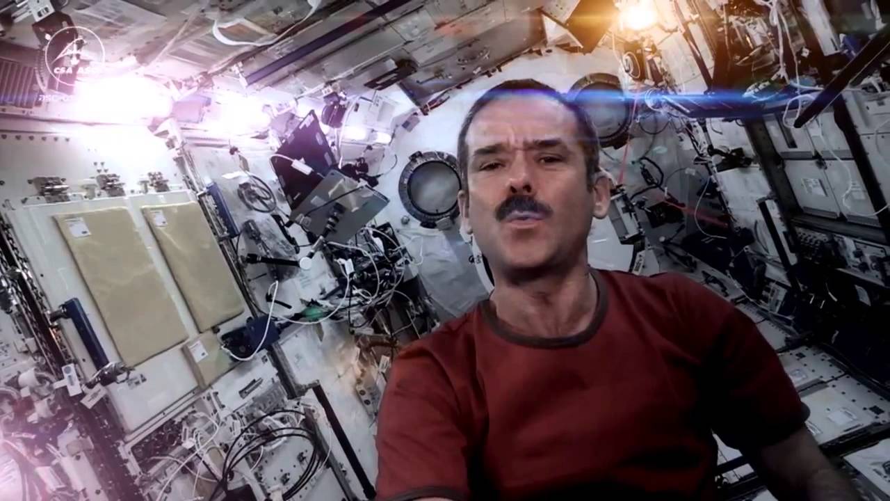 Chris Hadfield-Space Oddity - (first music video to be filmed in space)