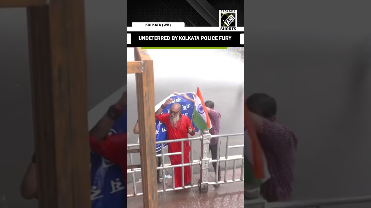 Amid heavy water cannons, a protester holds ground at Nabanna Students’ march