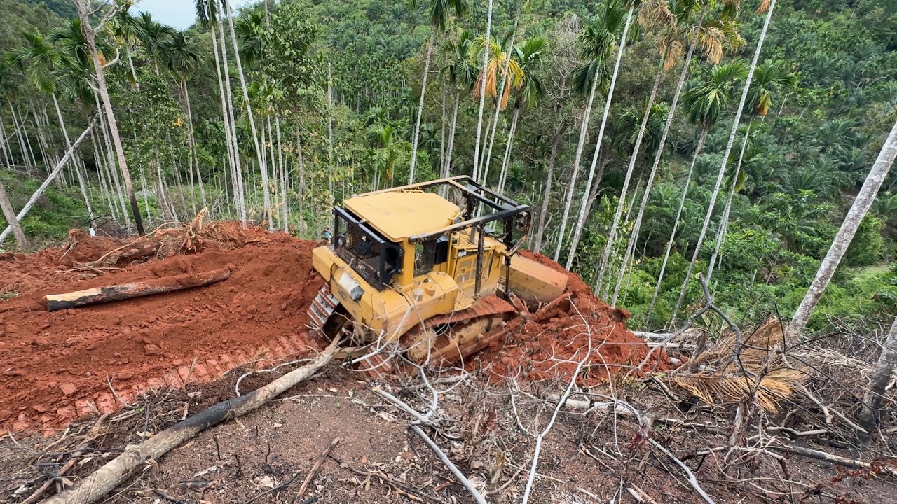D6R XL Bulldozer Faces Extreme Mountain Slope Terrain