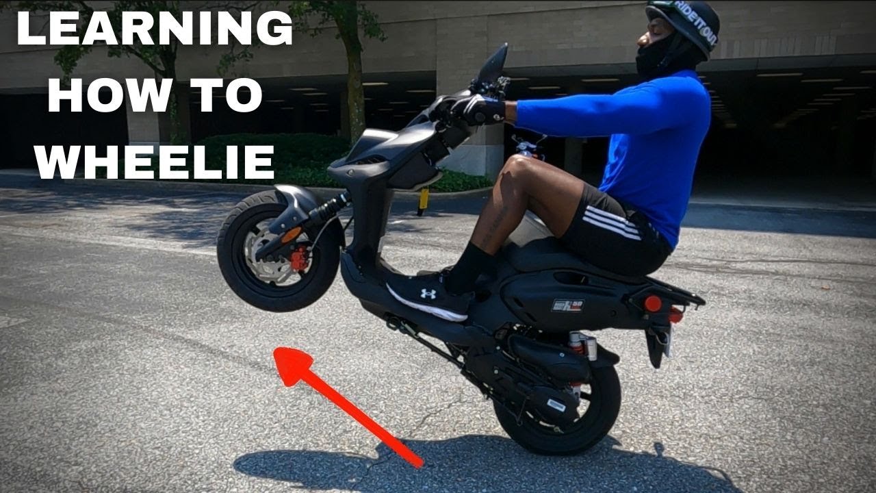 LEARNING HOW TO WHEELIE A SCOOTER ( 50cc SCOOTER WHEELIES )