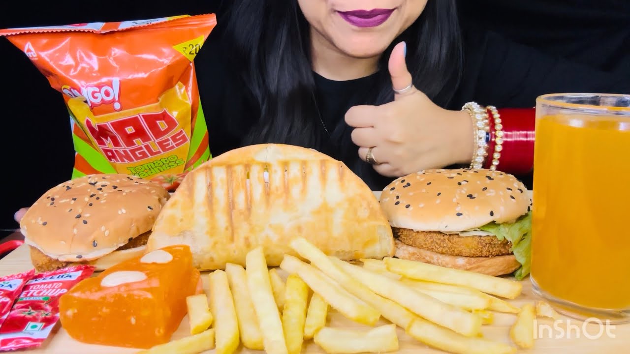 Eating Mc donald burger,chrunchy taco,paneer makhani burger,mc veggie burger 