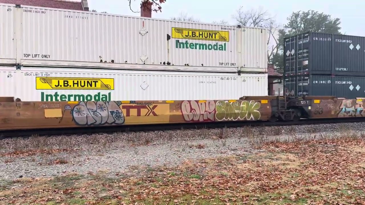 Southbound BNSF stack train Gainesville, Tx 12/24/25 with H1 leader and NS second out.