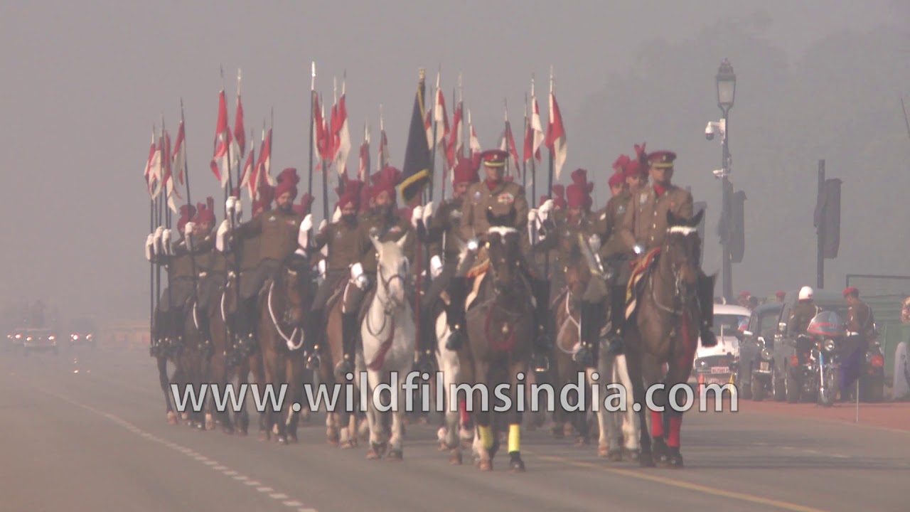 Indian army battalion on horses with flags for Republic Day rehearsals 2019