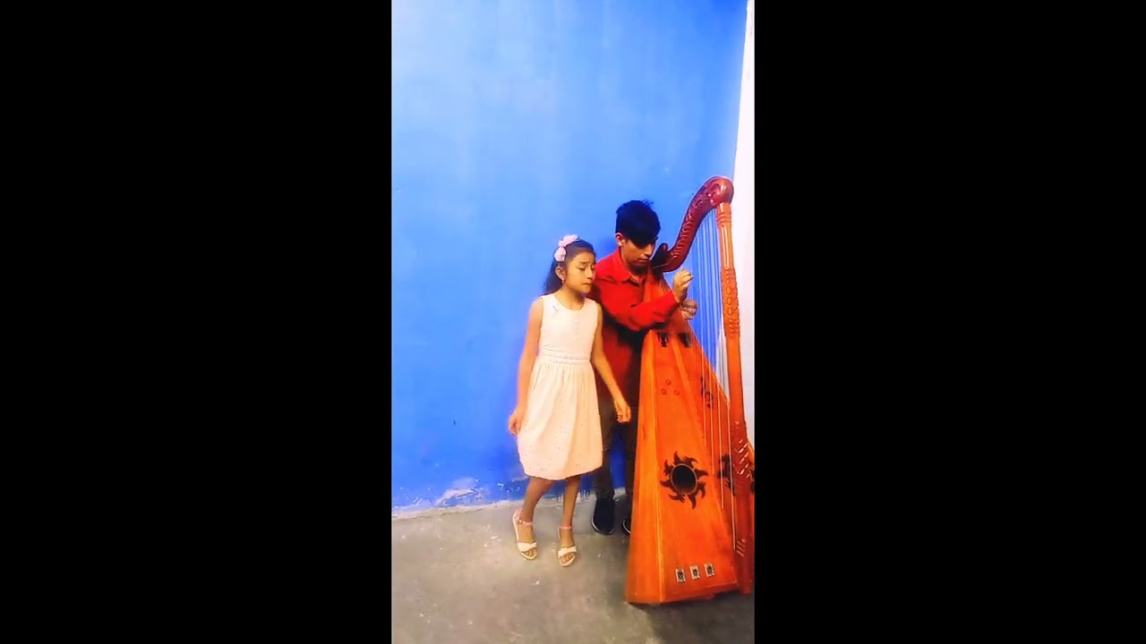 Evelin Lopez y GINO del arpa