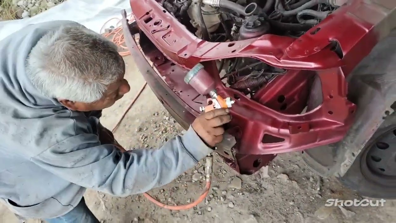 CAMBIANDO MARCO RADIADOR Y FACIA DE CHEVY MONZA 2010