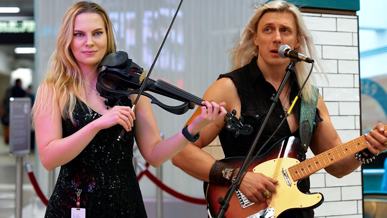 I Ask if She Knows Chris Isaac and This Violinist Shocks The Crowd 