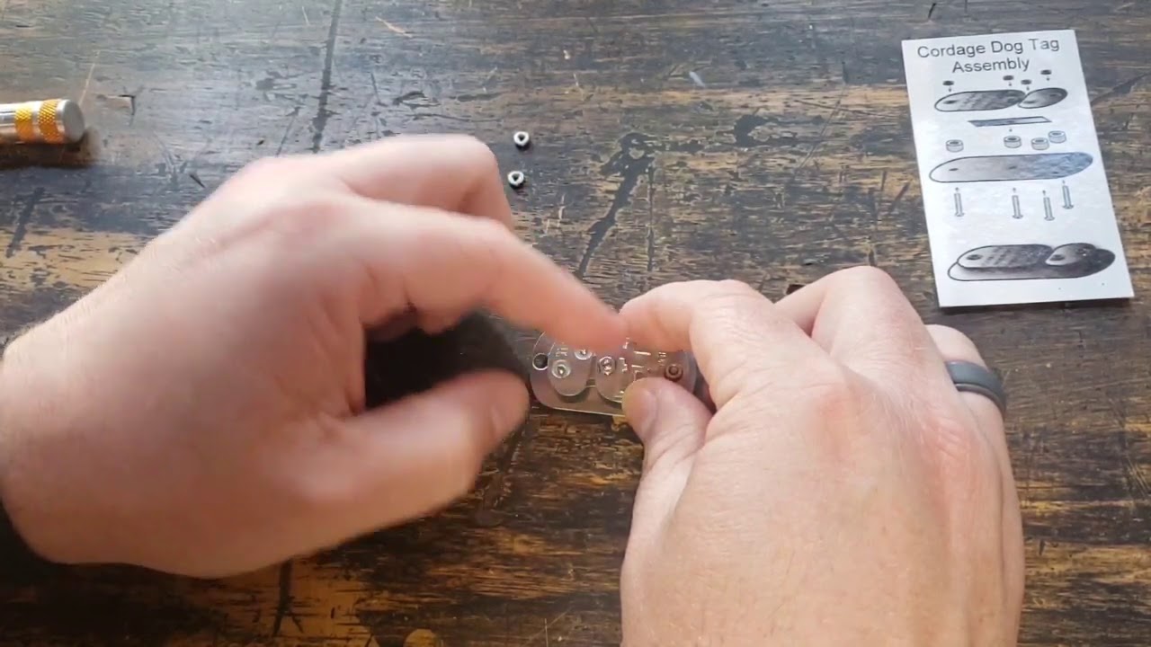 Cordage making dog tag tool assembly
