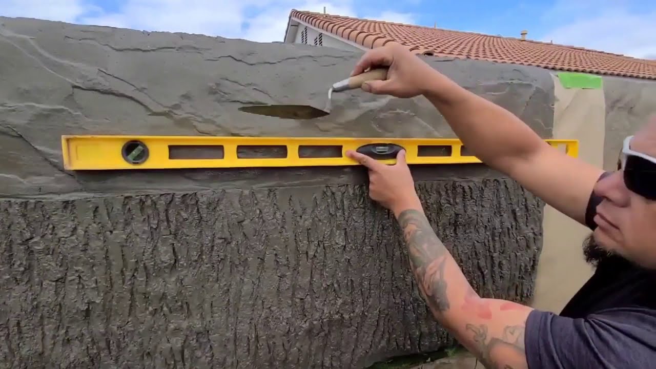 Combination of artificial rock and tree made of cement