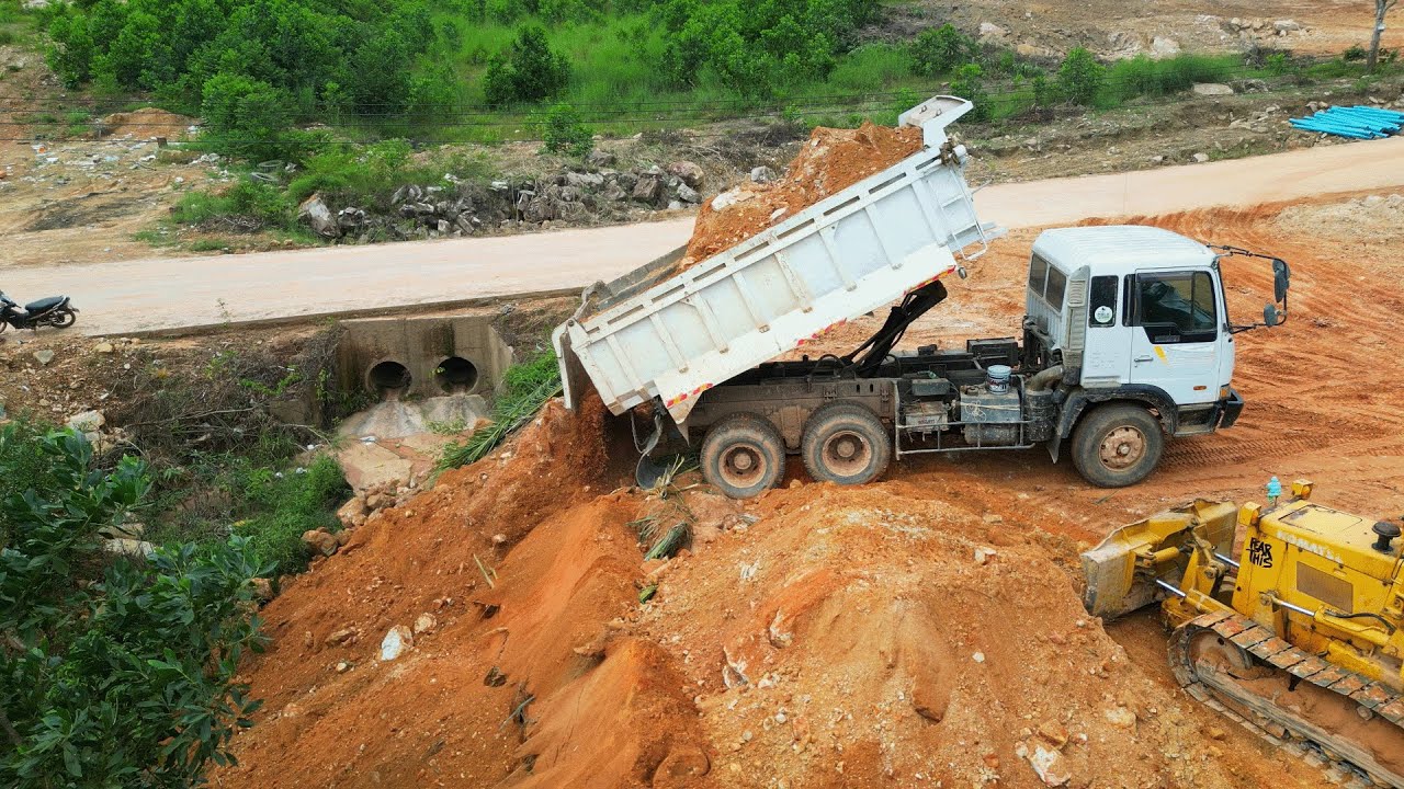 Massive Landfill Project in the Mountains with 15T Trucks Unloading Stone & Bulldozer Pushing