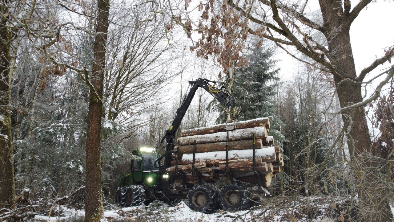 John Deere 1110E working in winter