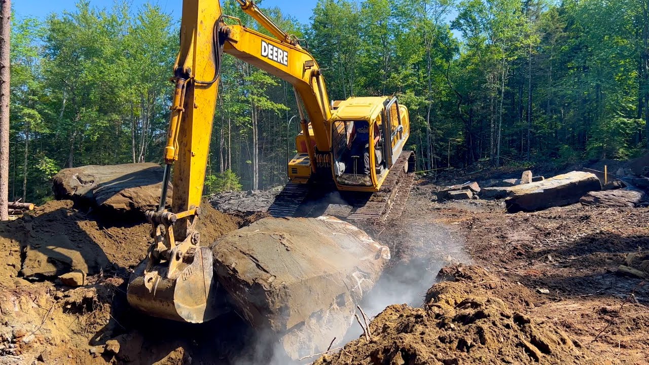Digging out a huge rock!  | Septic System Install Ep1