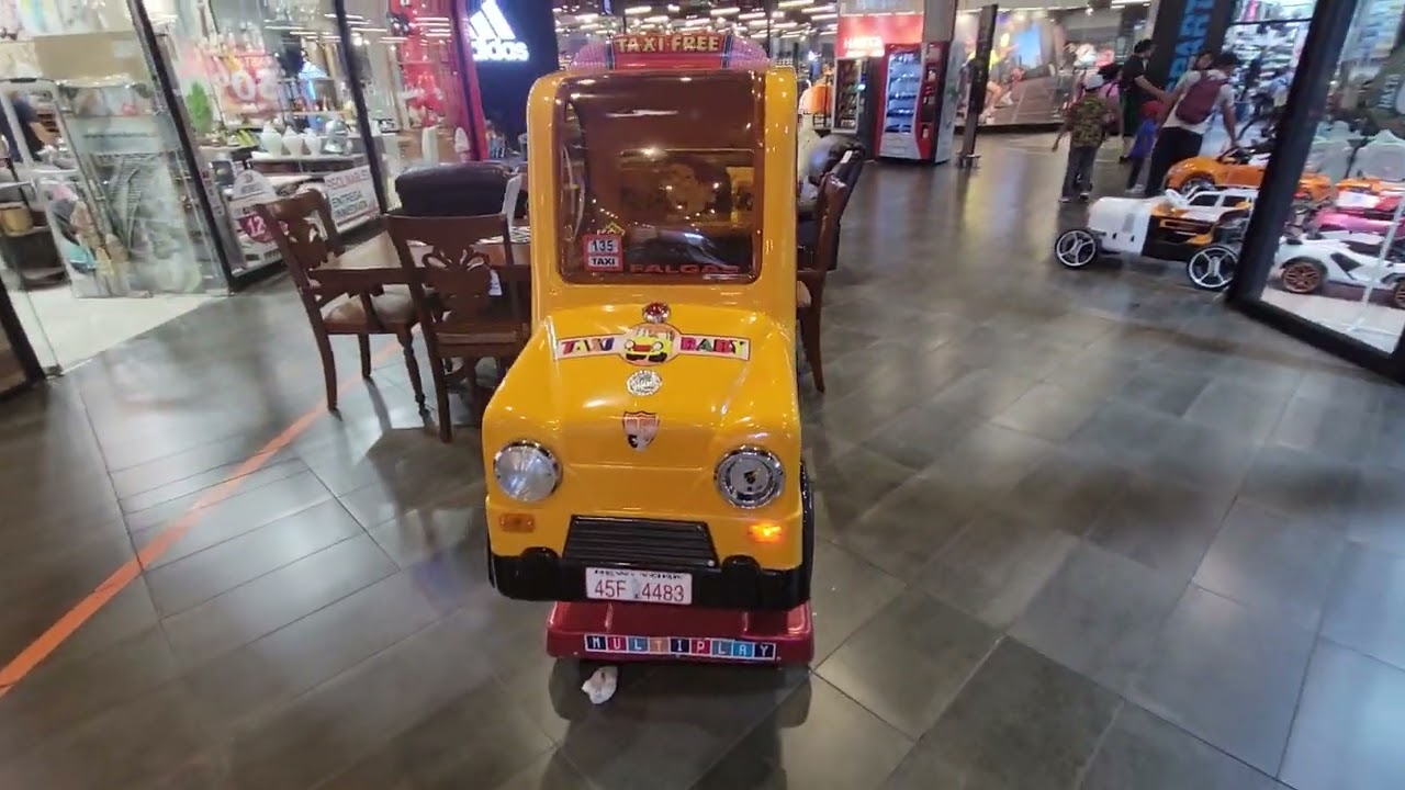 falgas taxi baby amarillo kiddie ride en el mall outlet vivo de temuco (audio incorrecto)