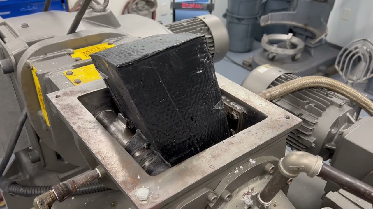 Ingesting a rubber bale