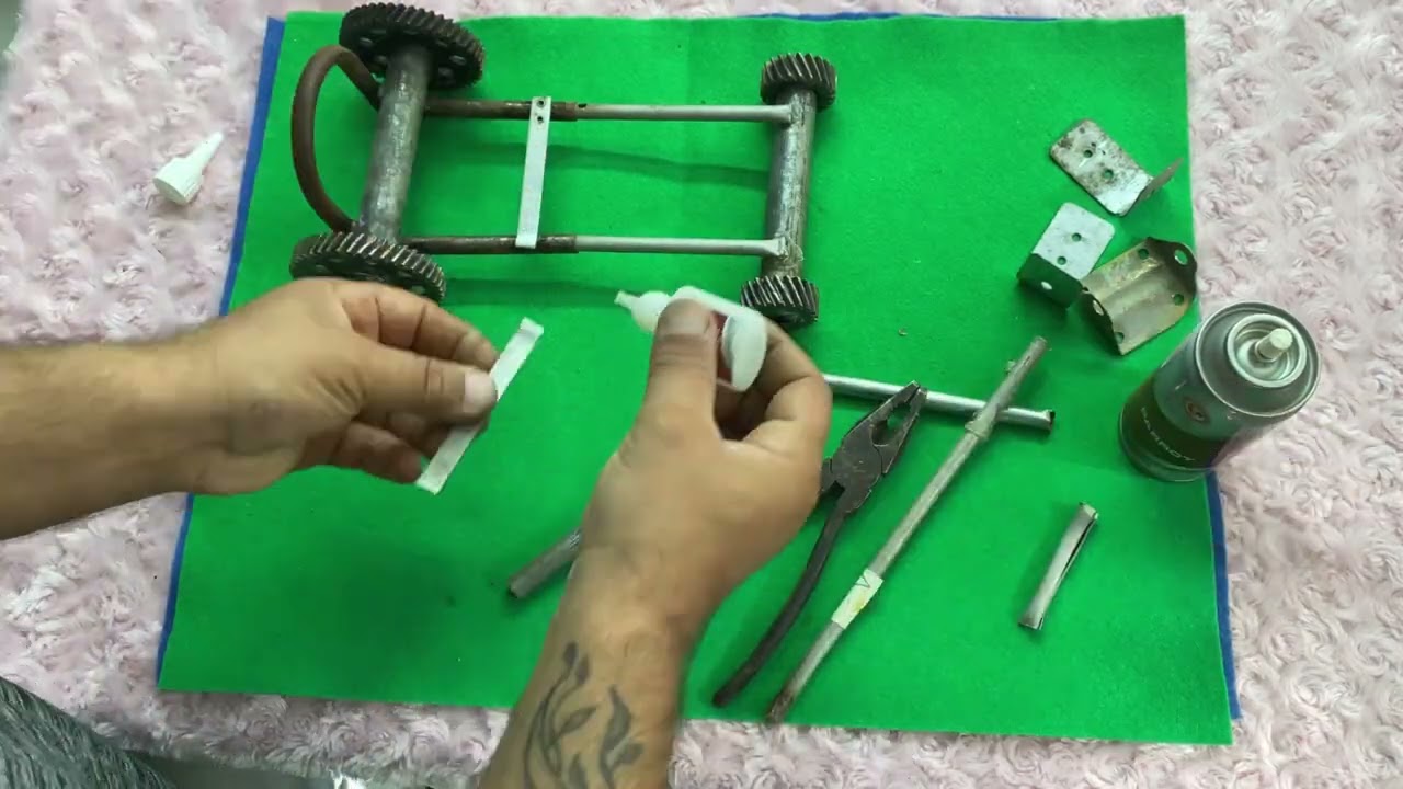DIY Car Made from Scrap Gears, Bolts & Metal Rods