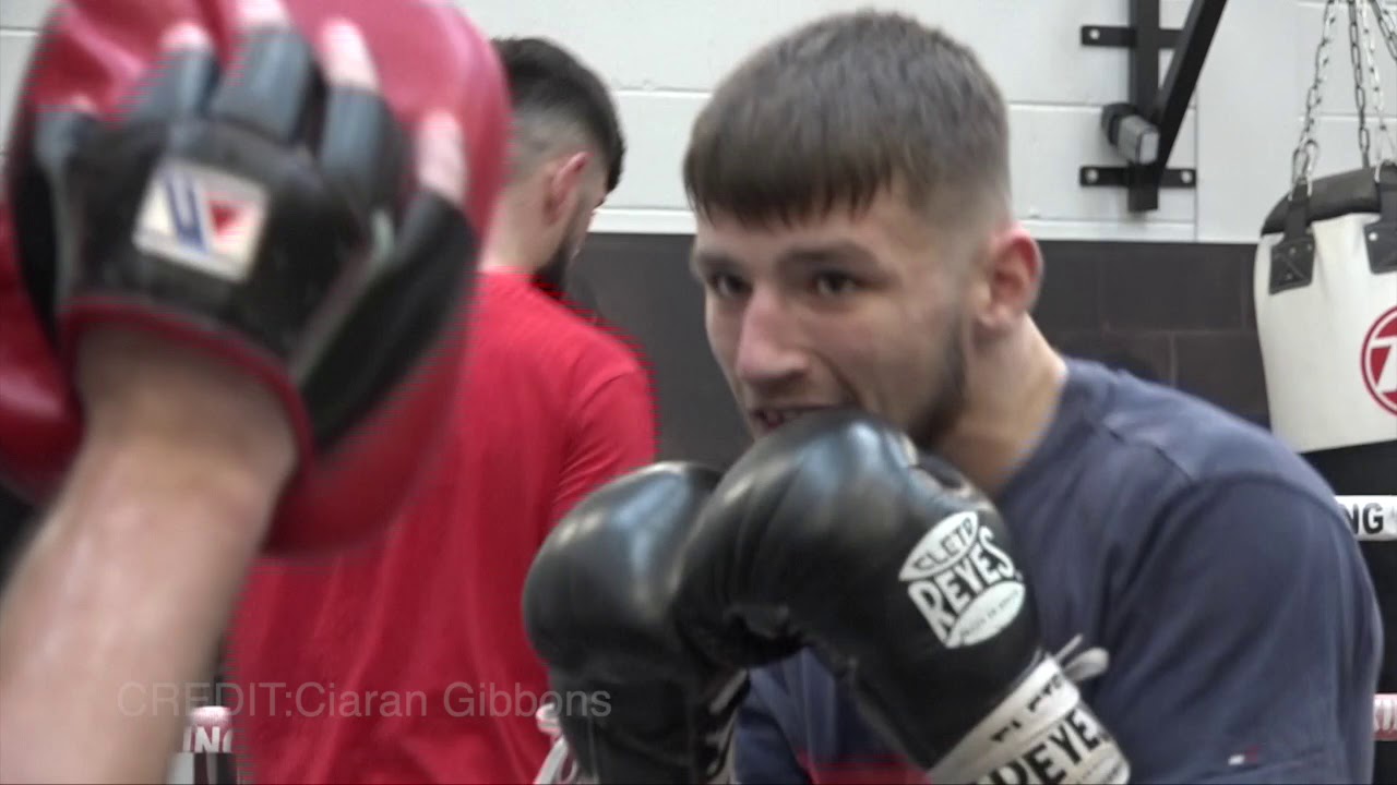 Rhondda boxer RHYS EDWARDS on body bag & pads at GARY LOCKETTS / Llanrumney Phoenix Boxing Club