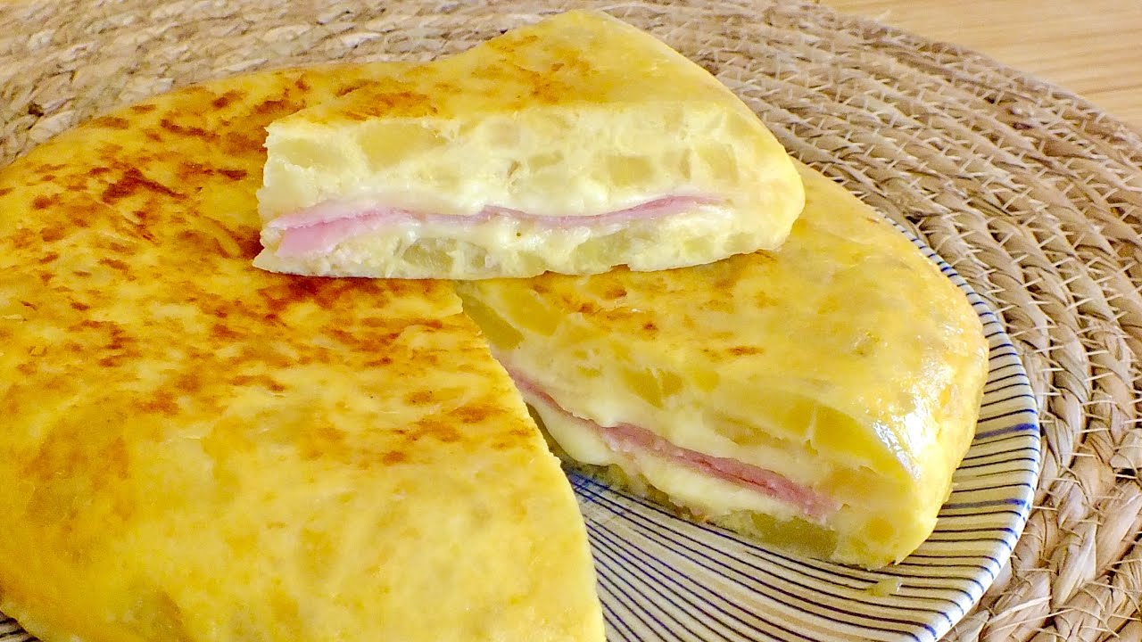 Tortilla Española de Patatas rellena de Jamón y Queso hecha a La Antigua