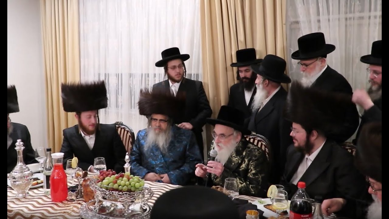 כ