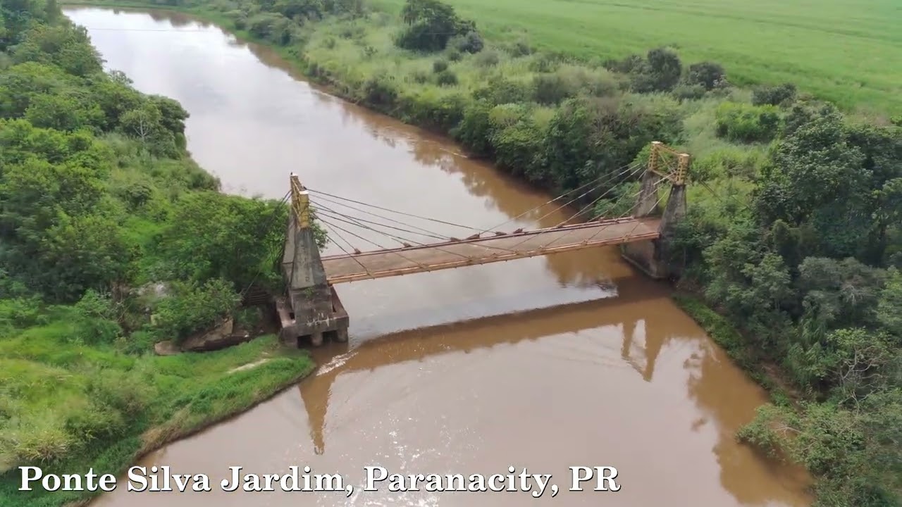 Voo drone, ponte e vila Silva Jardim, Paranacity, PR. editado.