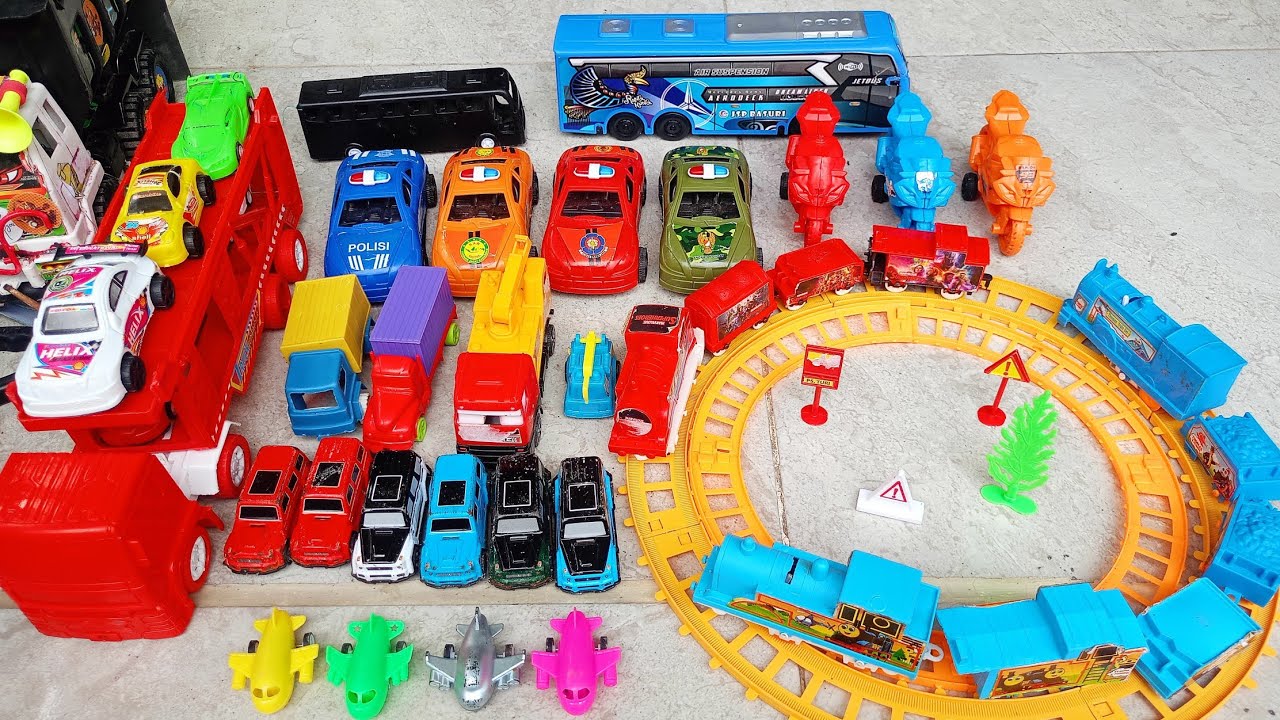 MELETUS BALON DAPAT HADIAH MAINAN KERETA API, TRUK, BUS BASURI, PESAWAT, MOTOR, MOBIL POLISI DLL